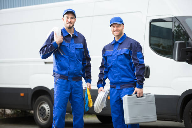 Fast Plumber Greenville technicians with their service van