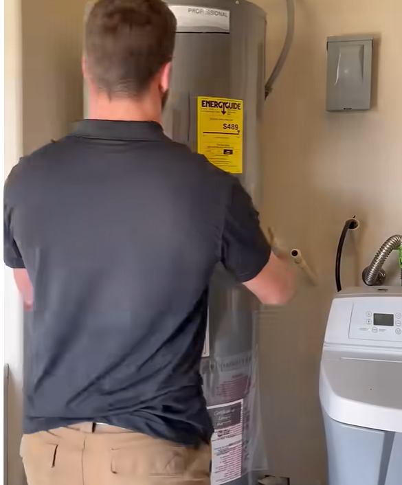 professional installing water heater